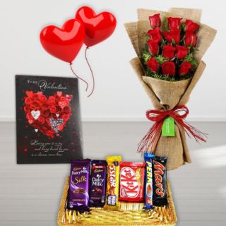 12 red roses hand bouquet with jute packing, valentine day card, 2 heart shape balloons, with basket of assorted chocolates 