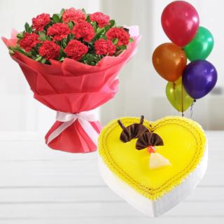 Bunch of 12 red carnations with heart shape pineapple fresh cream cake with 5 blown balloons
