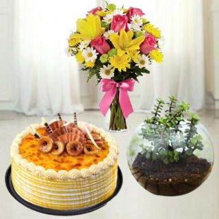 Mix flowers in glass vase with 1 pound honey cake with money plant terranium