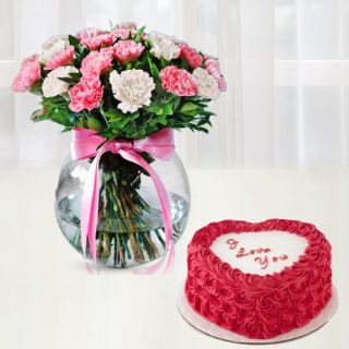 15 pink and white carnations in glass vase with heart shape red velvet with floral topping 