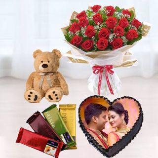 15 red roses bouquet, heart shape chocolate photo cake, set of 4 temptations,6 inch brown teddybear 