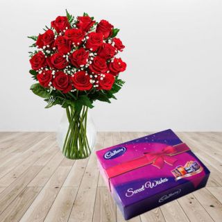 15 red roses in a glass vase with box of celebration chocolates 