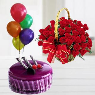 Basket of 40 red roses with black forest cake with 5 blown balloons