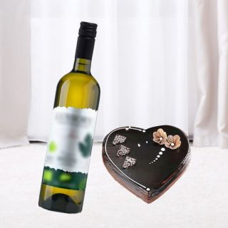 chocolate truffle heart shape rich quality cake with bottle of white  wine
