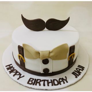 fondant moustache theme cake 