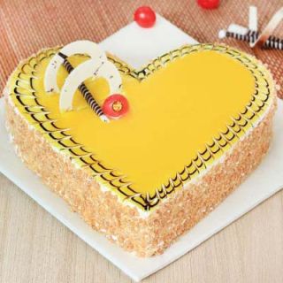 heart shape butterscotch premium quality anniversary  cake 