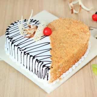  heart shape butterscotch vanilla anniversary cake 