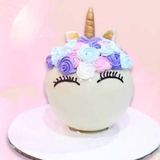 1 kg pinata round shape unicor theme cake in vanilla flavour 