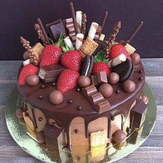  premium chocolate explosion cake, delicious chocolates, strawberries 