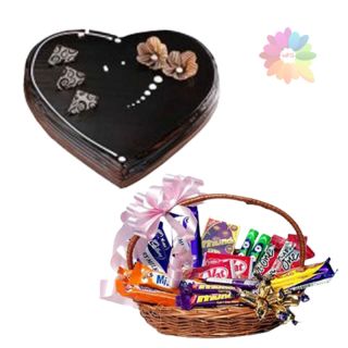 heart shape chocolate truffle cake with basket of assorted chocolates 