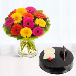 20 mix gerberas in glass vase with chocolate cool cake 