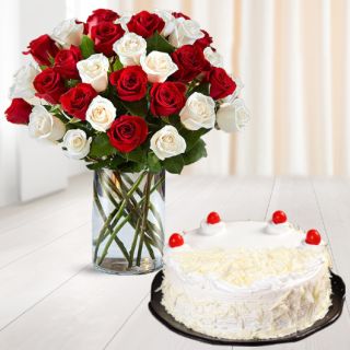 20 red and white mix roses in glass vase with white forest cake 