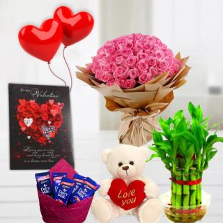 Bunch of 50 pink roses, 6 inch height teddybear, pack of 5 Kitkat chocolates, 2 layer Lucky bamboo plant, 5 blown balloons with greeting card 