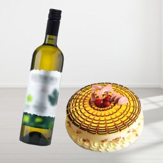 Pineapple fresh cream cake with exotic fruits topping with bottle of white wine