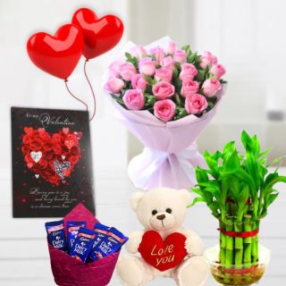 Bunch of 15 pink roses, 6 inch height teddybear, pack of 5 Kitkat chocolates, 2 layer Lucky bamboo plant, 5 blown balloons with greeting card