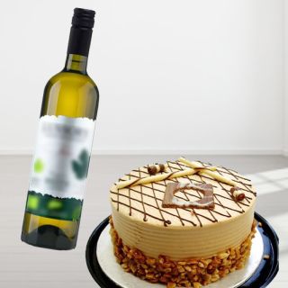 coffee walnut premium quality cake with bottle of white wine