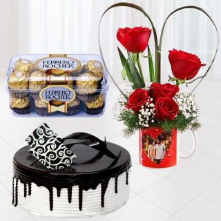 5 red roses arranged in photo mug, 16 pcs rocher ferrero chocolates, half kg choco vanilla cake