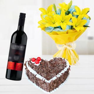 Bunch of 10 asiatic lilies with heart shape black forest fresh cream cake with bottle of red wine