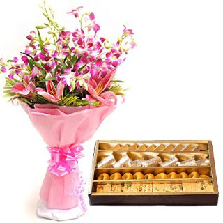 Bunch of lilies and orchids with 1 kg assorted sweets
