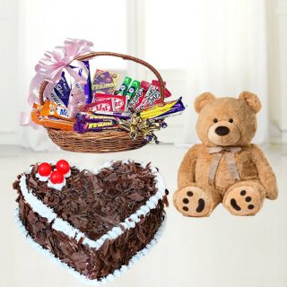 3 feet height Brown colour teddy bear with heart shape black forest cake with assorted chocolate basket 