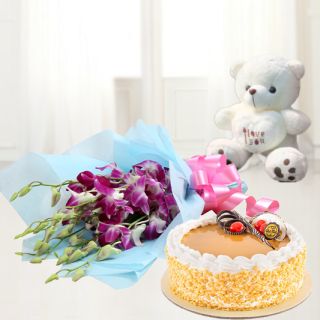 Bunch of orchids with fresh cream 1 kg butterscotch cake with a cute 6 inch teddy bear
