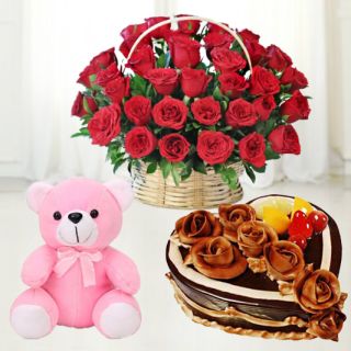 Basket of 25  red roses, chocolate heart shape cake with exotic fruits topping & 1 feet height teddybear