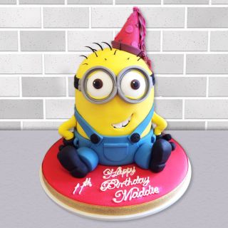  minion theme cake in vanilla flavour 