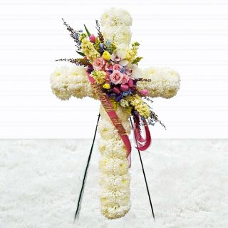 1.5 feet height cross of White crysanthemums with mix flowers arranged in centre