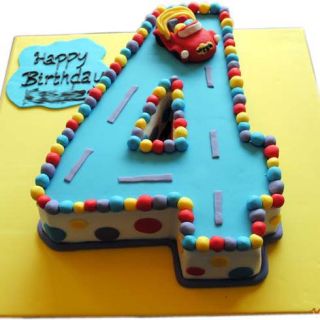 4 shape numeric theme cake with race track theme in 2 kg kids cake