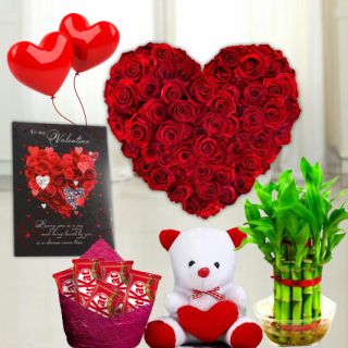 Heart shape arrangement of 40 red roses, set of 3 toblerone chocolates, 6 inch height teddybear, 2 layer Lucky bamboo plant, 5 blown balloons with greeting card 
