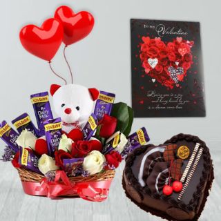 6 red roses, 6 dairy milk  arrangement with teddybear sitting in it, half kg heart shape butterscotch cake, 2 heart shape balloon, valentine greeting card 