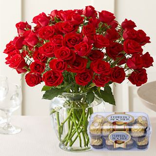 50 red roses in glass vase with 16 pcs rocher ferrero chocolates