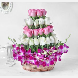 Basket Arrangement of 10 Lavender orchids with 40 pink and white roses 
