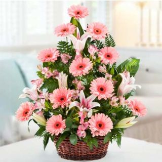 Basket arrangement of 20 pink gerberas with 5 pink lilies 
