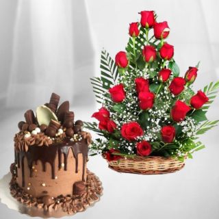 Basket arrangement of 20 red roses with 1 kg chocolate explosion cake