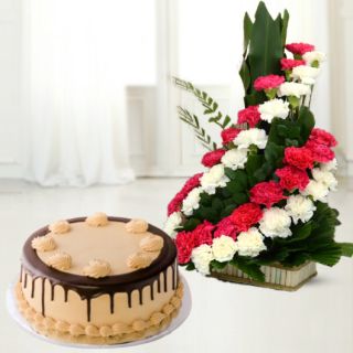 Basket Arrangement of 35 pink and white carnations with chocolate cake 