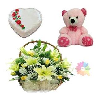 Basket arrangement of exotic lilies with fresh roses with heart shape vanilla fresh cream cake with 2 feet height teddy bear