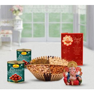 Basket of assorted dry fruits , box of Gulab Jamun, Ganesha idol with Diwali Greeting card 