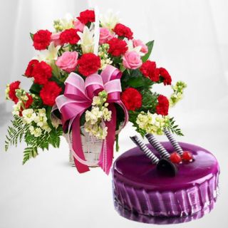 Basket of 20 red roses with pink carnations with black currant cake 