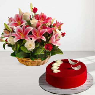 Basket of lilies and roses with red velvet cool cake 