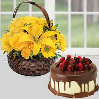 Basket of lilies gerberas with roses with choco strawberry cake 