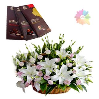 Basket of whitle lilies&pink roses with 3 bournville chocolates