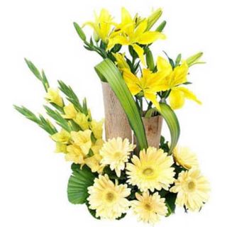 Beautiful Arrangement of 6 yellow Gerberas,2lilies