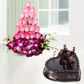 Beautiful Basket Arrangement of lavender orchids with pink roses with chocolate heart shape cake 