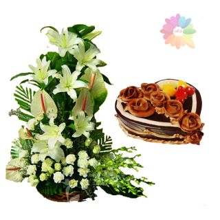 Beautiful Basket arrangement of white lilies & roses with 1 kg heart shape chocolate cake