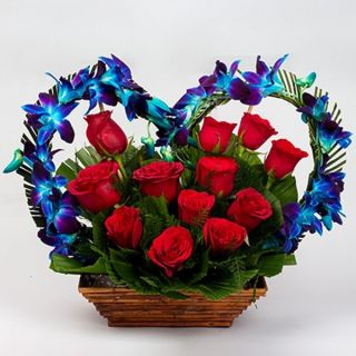 Beautiful Basket of 8 Blue orchids with 12 red roses 