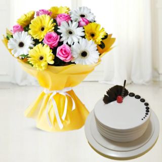 Beautiful bouquet of mix flowers with vanilla cool cake 