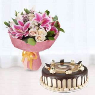 Beautiful bunch of exotic mix flowers with half kg irish chocolate cake 