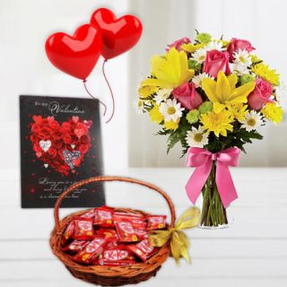 Beautiful mix flowers arrangement in glass vase , valentine day greeting card,2 heart shape balloons ,with kitkat chocolate basket 