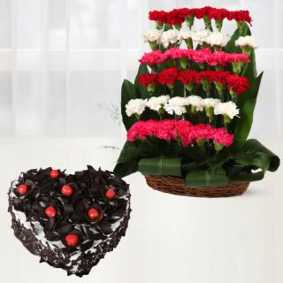 Beautiful step arrangement of 40 mix colour carnations with black forest heart shape cake 